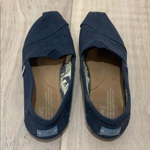 Navy blue Toms sneakers